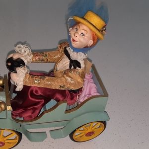 Rare Klumpe and Roldan doll in vintage car